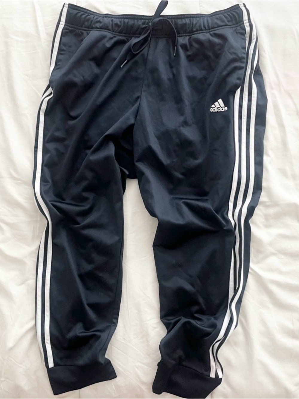 Dark blue Adidas track pants